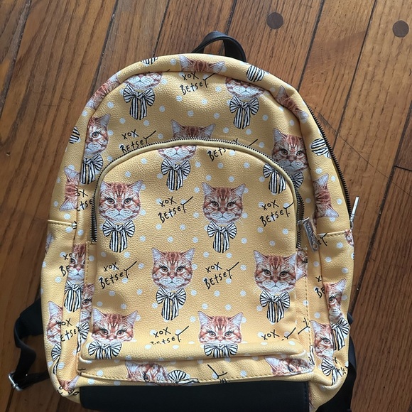 Betsey Johnson Handbags - Betsey Johnson Yellow Cat Print Backpack
